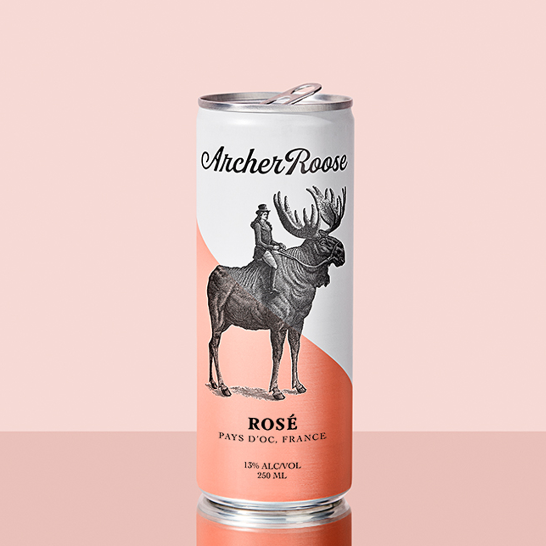 Archer Roose Rose Wine in a Can on a reflective surface | Archer Roose Wines | Wine in a Can | Canned Wine | Luxury Wine. In Cans | Rose | French Rose | Pays D'Oc